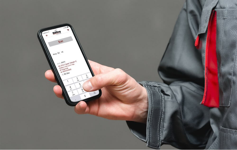 Ein Smartphone mit der Nüßing ScanApp